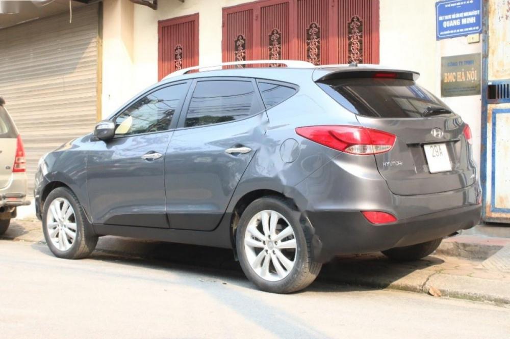 Hyundai Tucson 2.0 AT 4WD 2010 - Bán xe Hyundai Tucson 2.0 AT 4WD đời 2010, màu xám, nhập khẩu á tốt.