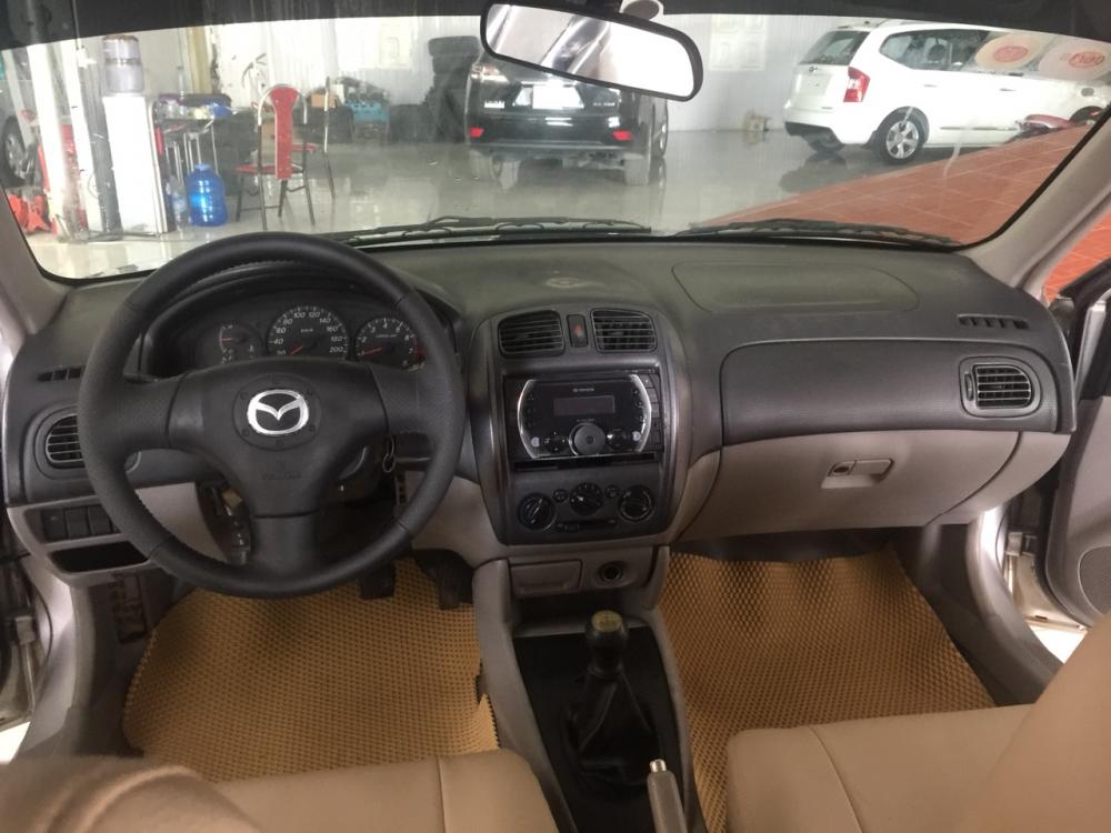 Mazda 323 1.6 2003 - Cần bán Mazda 323 1.6 đời 2003, màu bạc