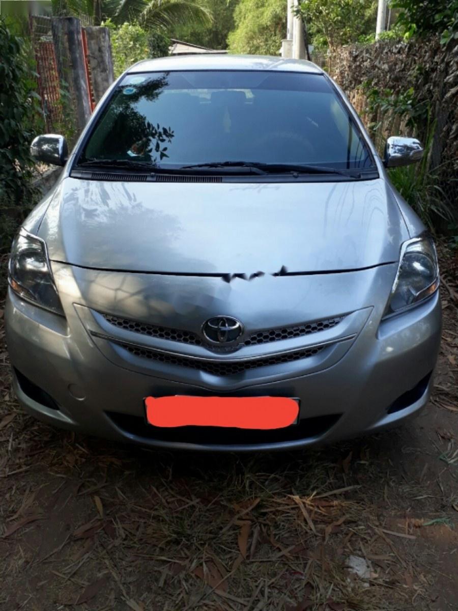 Toyota Vios 1.5E 2010 - Bán xe Toyota Vios 1.5-E 2010, màu bạc xe gia đình giá cạnh tranh