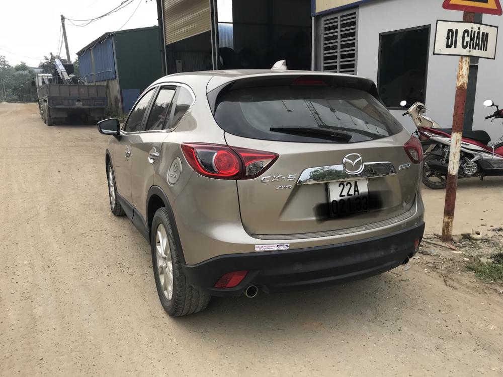 Mazda CX 5 2013 - Bán ô tô Mazda CX 5 đời 2013, màu vàng chính chủ, giá chỉ 650 triệu