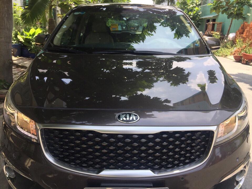 Kia Sedona Gat 2015 - Bán Kia Sedona nâu hột nhãn 2015 bản tự động 3.3 full option mới zin