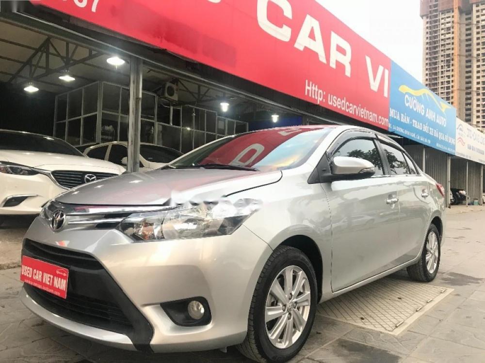 Toyota Vios E 1.5 MT 2014 - Cần bán gấp Toyota Vios E 1.5 MT đời 2014, màu bạc 