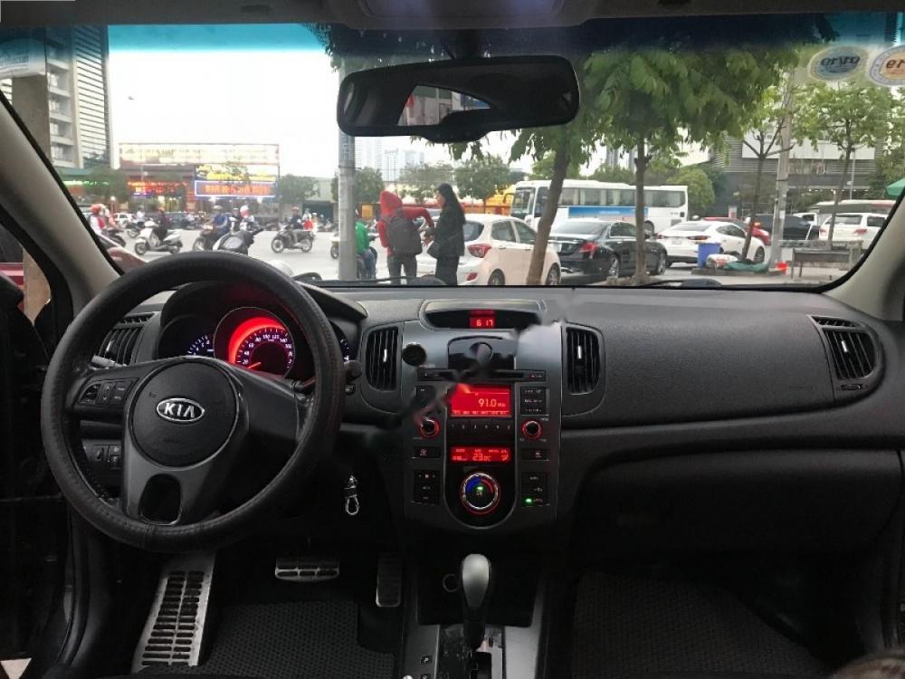 Kia Cerato 1.6 AT 2010 - Cần bán Kia Cerato 1.6 AT sản xuất năm 2010, màu đen, nhập khẩu 