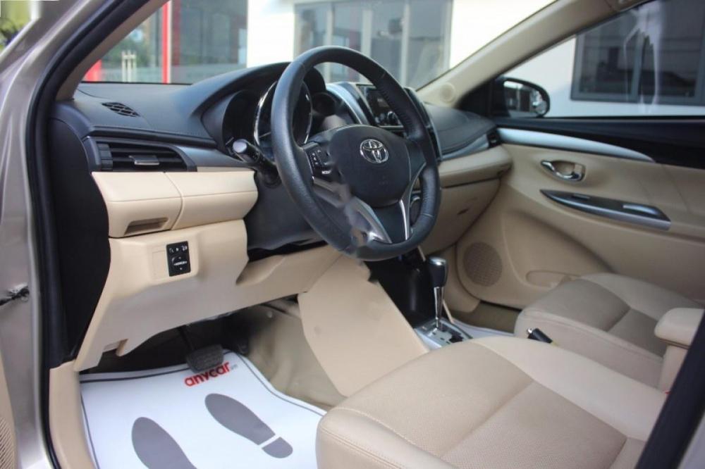 Toyota Vios 1.5G AT 2017 - Cần bán lại xe Toyota Vios 1.5G AT sản xuất 2017, màu vàng