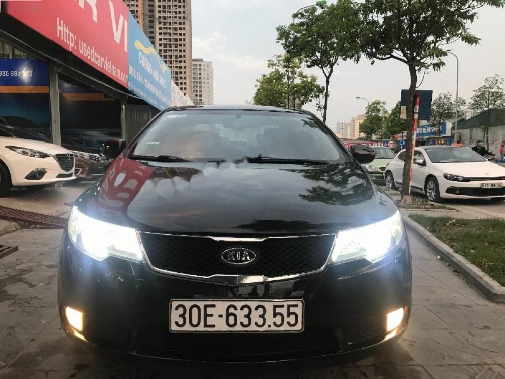 Kia Cerato 1.6 AT 2010 - Cần bán Kia Cerato 1.6 AT sản xuất năm 2010, màu đen, nhập khẩu 