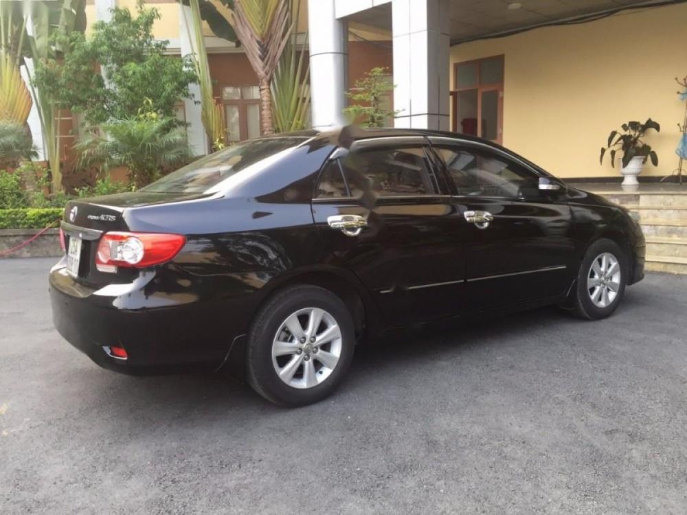 Toyota Corolla altis 2014 - Chính chủ bán ô tô Toyota Corolla altis đời 2014, màu đen