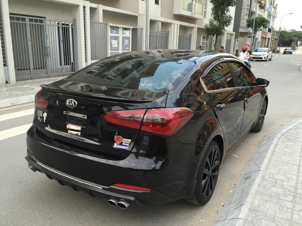 Kia K3 2.0AT 2014 - Cần bán xe Kia K3 2.0 AT năm 2014, màu đen, giá chỉ 560 triệu