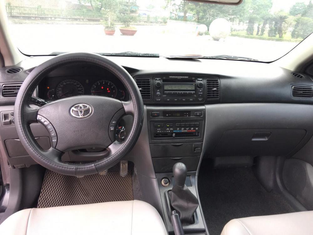 Toyota Corolla altis 1.8MT 2006 - Cần bán xe Toyota Corolla altis 1.8MT đời 2006, màu đen, xe gia đình, giá tốt