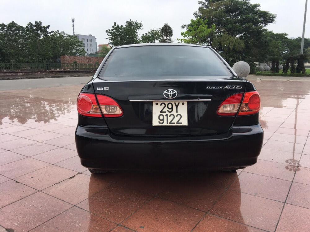 Toyota Corolla altis 1.8MT 2006 - Cần bán xe Toyota Corolla altis 1.8MT đời 2006, màu đen, xe gia đình, giá tốt