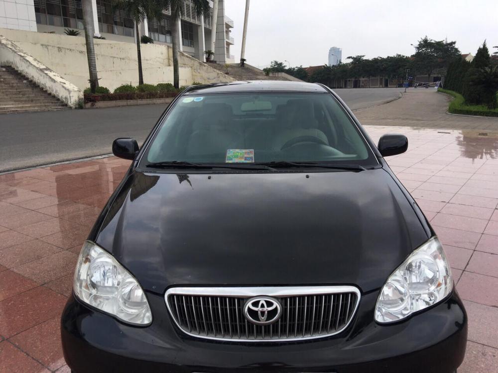 Toyota Corolla altis 1.8MT 2006 - Cần bán xe Toyota Corolla altis 1.8MT đời 2006, màu đen, xe gia đình, giá tốt