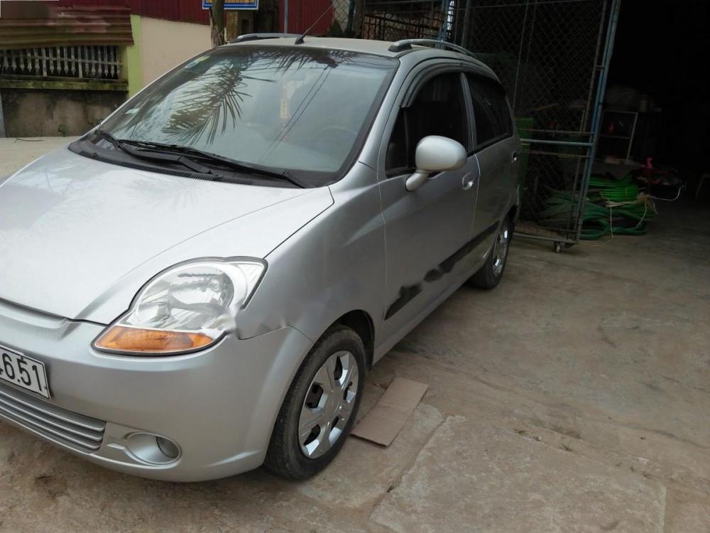 Chevrolet Spark LT 0.8 MT 2009 - Cần bán gấp Chevrolet Spark LT 0.8 MT 2009, màu bạc giá cạnh tranh