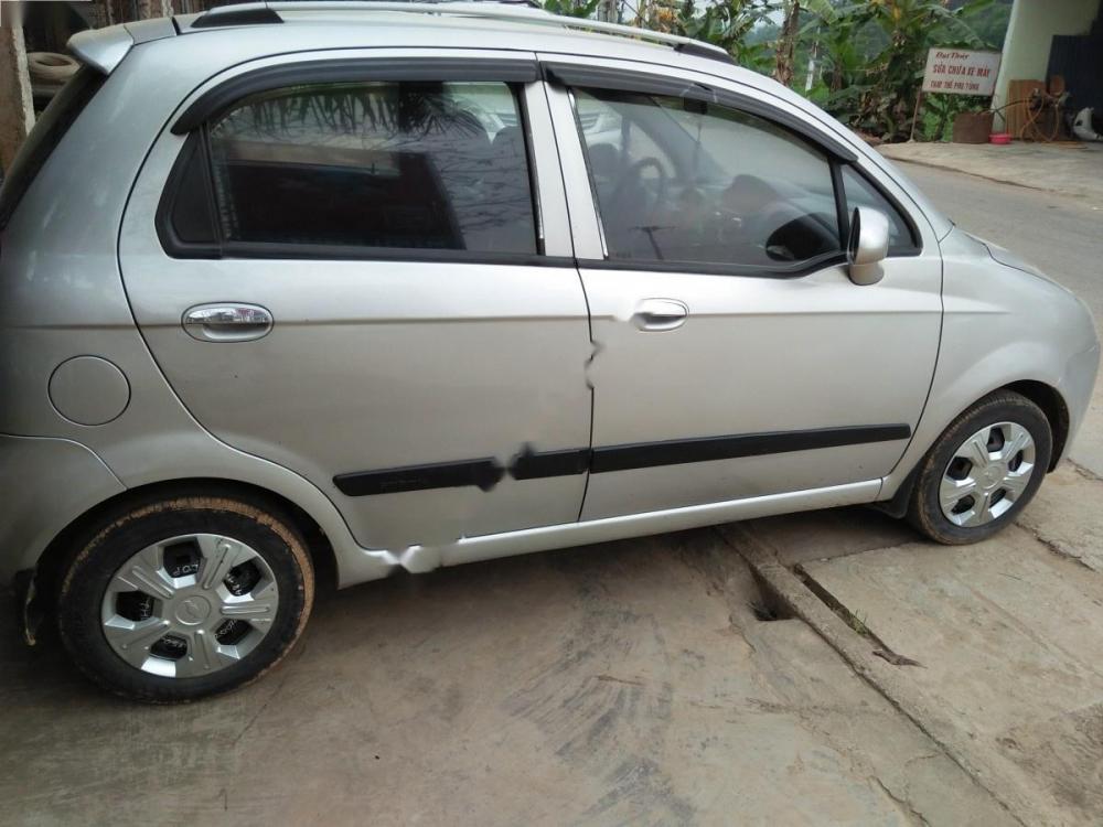 Chevrolet Spark LT 0.8 MT 2009 - Cần bán gấp Chevrolet Spark LT 0.8 MT 2009, màu bạc giá cạnh tranh