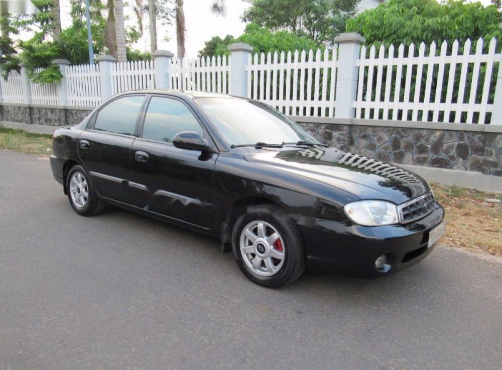 Kia Spectra 2005 - Bán xe Kia Spectra đời 2005, màu đen  