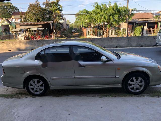 Daewoo Magnus 2004 - Cần bán lại xe Daewoo Magnus năm sản xuất 2004, màu bạc chính chủ