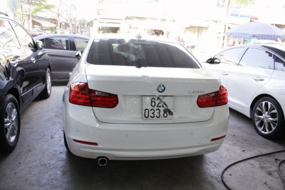 BMW 3 Series 320i 2014 - Cần bán xe BMW 3 Series 320i đời 2014, màu trắng, xe nhập số tự động