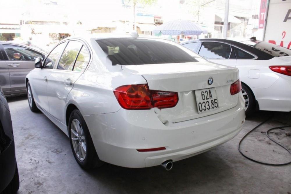 BMW 3 Series 320i 2014 - Cần bán xe BMW 3 Series 320i đời 2014, màu trắng, xe nhập số tự động