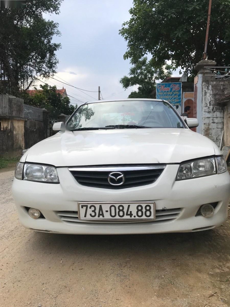 Mazda 626 2002 - Cần bán gấp Mazda 626 2002, màu trắng