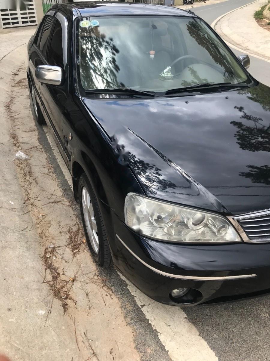 Ford Laser 2004 - Bán lại xe Ford Laser 2004, màu đen, xe nhập