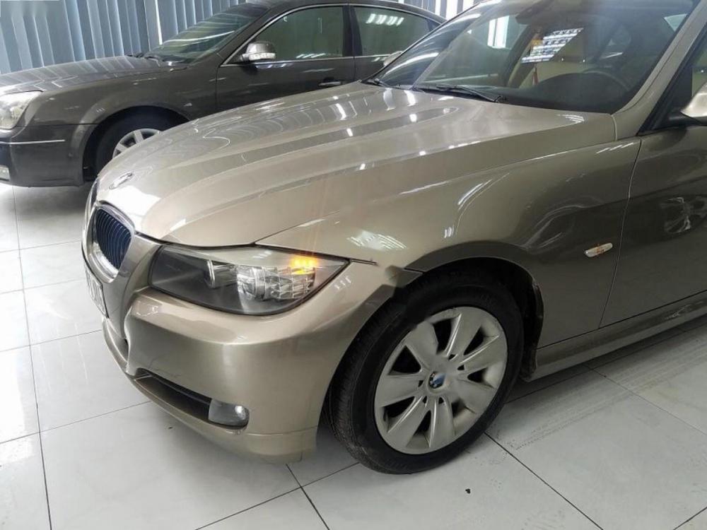 BMW 3 Series 320i 2010 - Chính chủ bán BMW 3 Series 320i sản xuất 2010, màu vàng, nhập khẩu