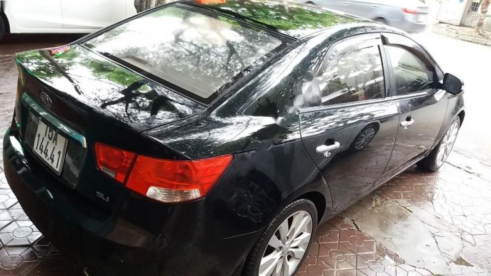 Kia Forte SLi 1.6 AT 2010 - Bán Kia Forte SLI 2010, màu đen, xe nhập chính chủ