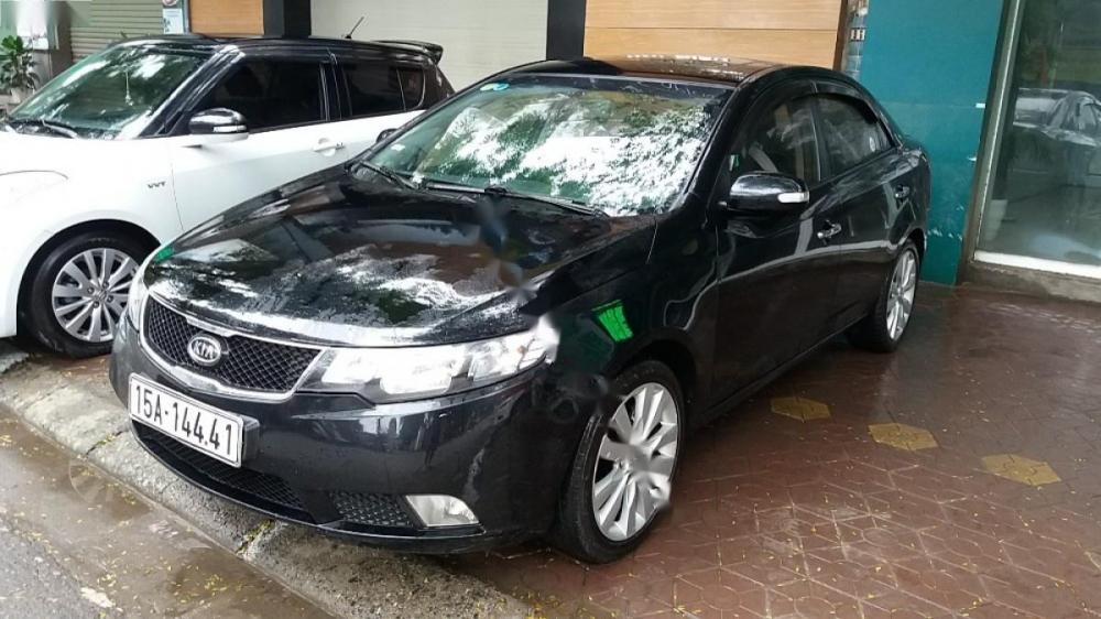 Kia Forte SLi 1.6 AT 2010 - Bán Kia Forte SLI 2010, màu đen, xe nhập chính chủ