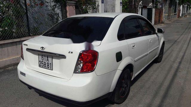 Daewoo Lacetti   1.6 EX  2005 - Cần bán gấp Daewoo Lacetti 1.6 EX năm 2005, màu trắng xe gia đình