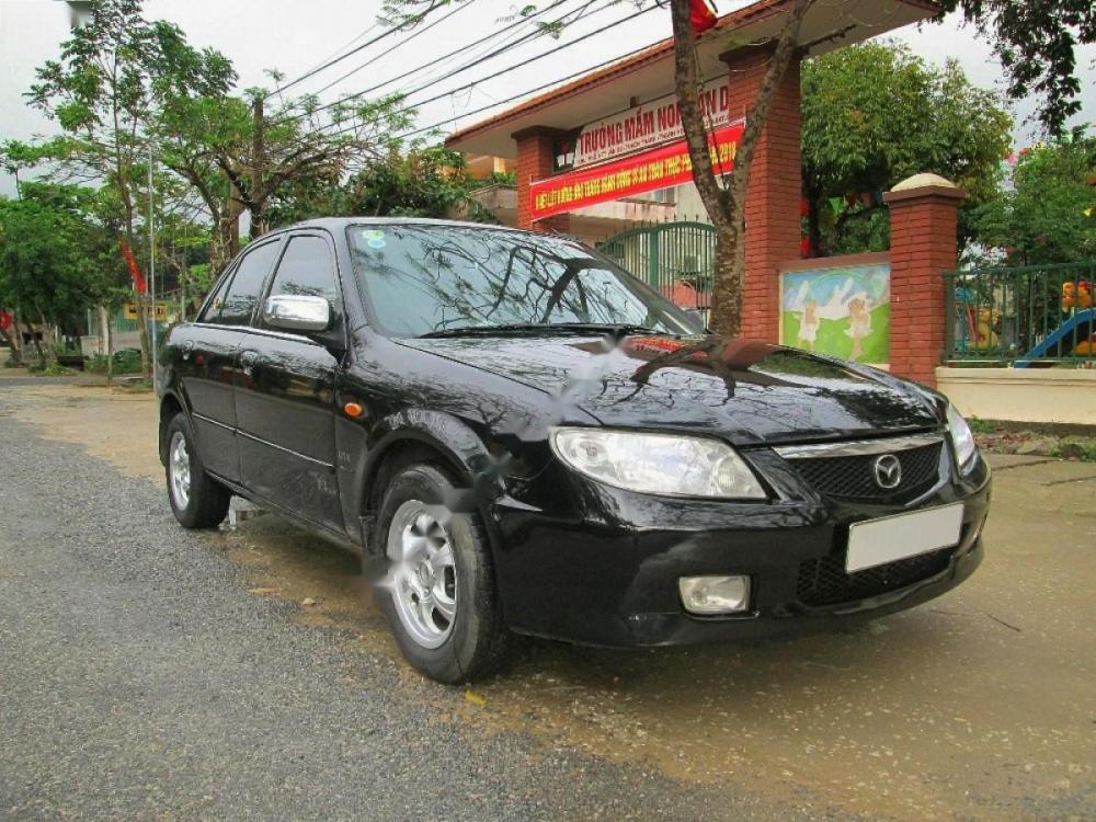 Mazda 323 GLX 2003 - Bán Mazda 323 GLX đời 2003, màu đen, 145 triệu