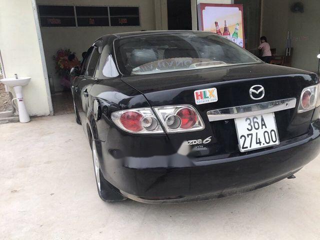 Mazda 6 MT 2003 - Cần bán xe Mazda 6 MT sản xuất năm 2003 xe gia đình