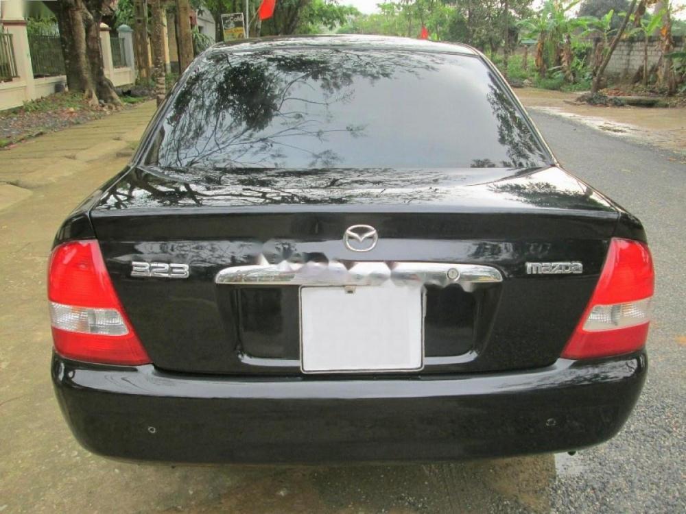 Mazda 323 GLX 2003 - Bán Mazda 323 GLX đời 2003, màu đen, 145 triệu