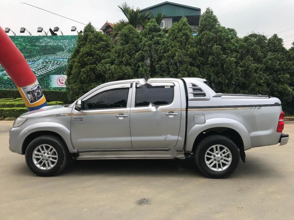 Toyota Hilux 3.0G 4x4 MT 2014 - Việt Anh Auto bán xe Toyota Hilux 3.0G 4x4 MT đời 2014, màu bạc, nhập khẩu 