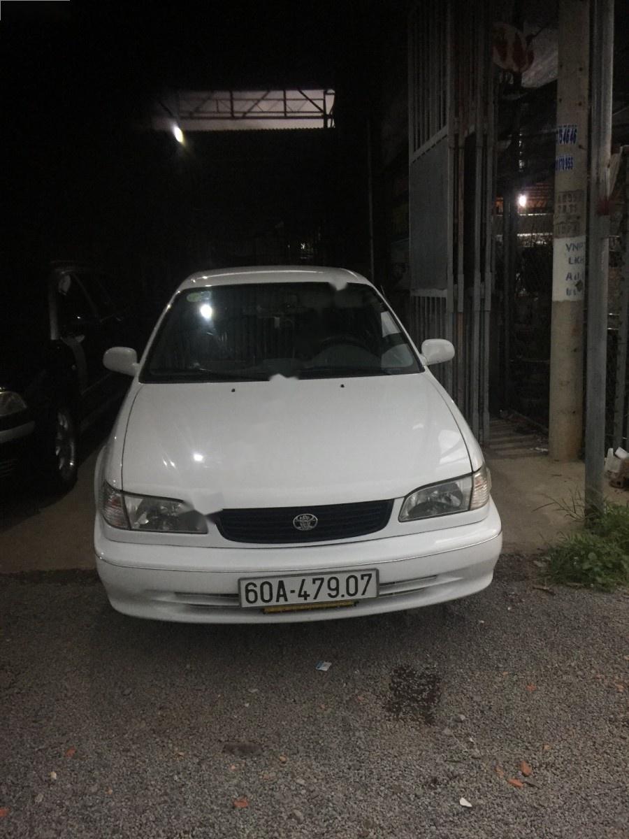 Toyota Corolla 2000 - Gia đình bán xe Toyota Corolla năm sản xuất 2000, màu trắng, xe nhập