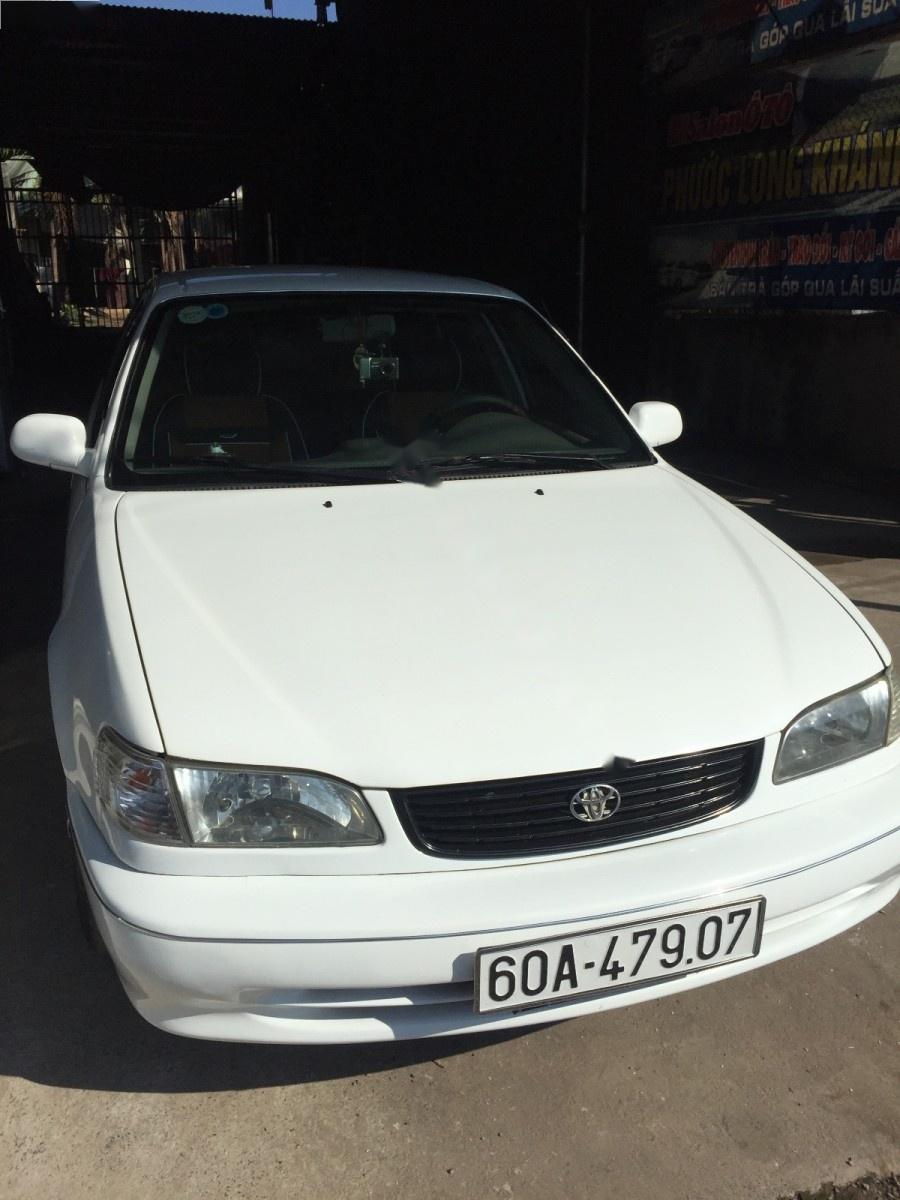 Toyota Corolla 2000 - Gia đình bán xe Toyota Corolla năm sản xuất 2000, màu trắng, xe nhập