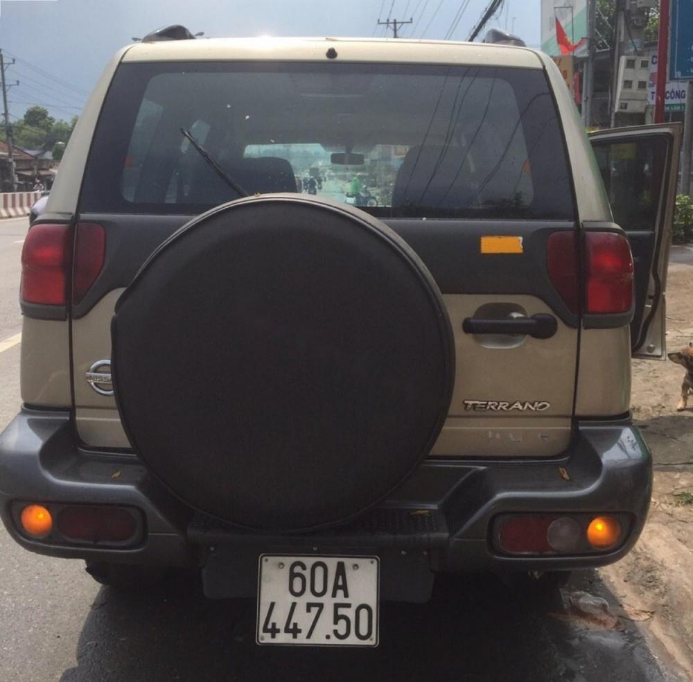 Nissan Terrano 2.7 2003 - Gia đình bán xe Nissan Terrano 2.7 đời 2003, màu vàng, xe nhập