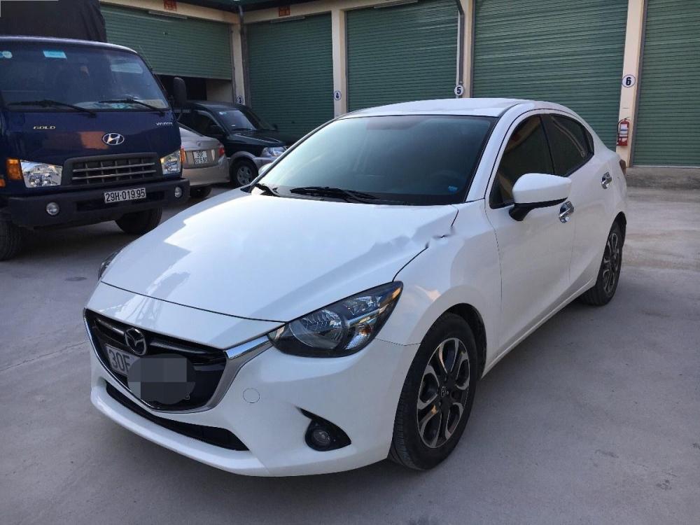 Mazda 2 1.5 AT 2015 - Gia đình bán xe Mazda 2 1.5 AT năm sản xuất 2015, màu trắng