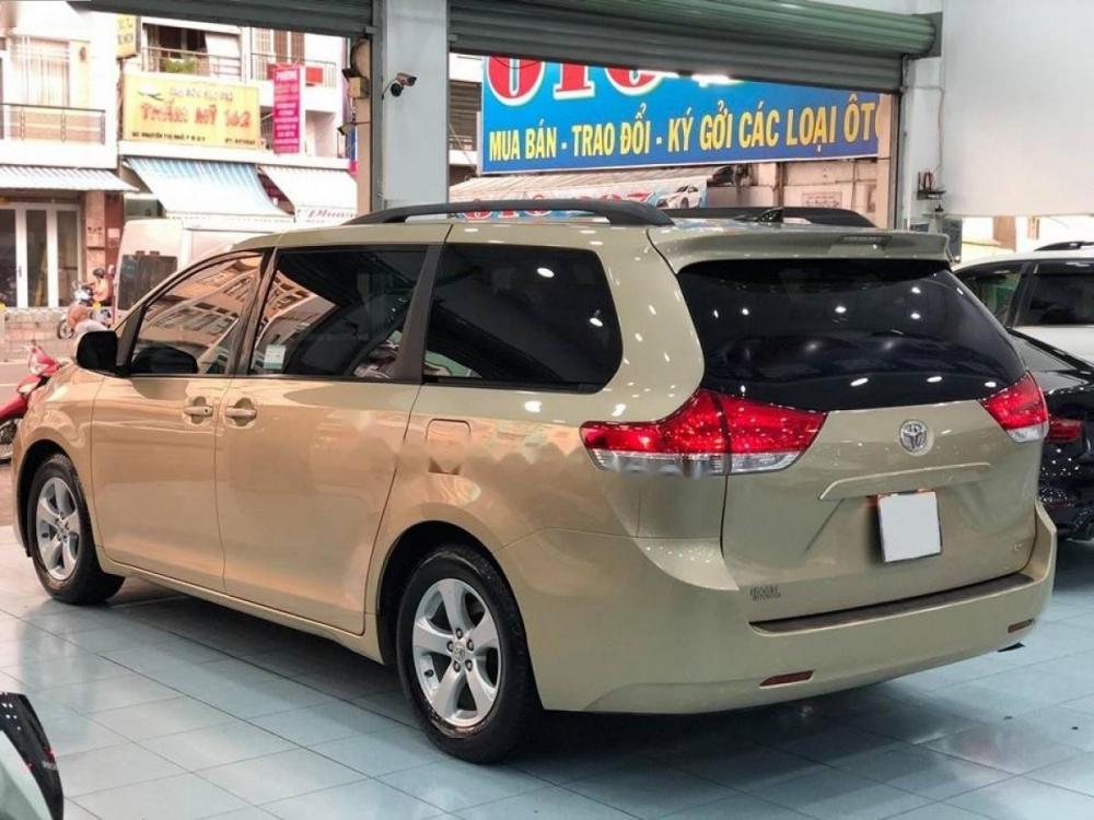 Toyota Sienna LE 3.5 2010 - Bán Toyota Sienna LE 3.5 2010, màu vàng, xe nhập