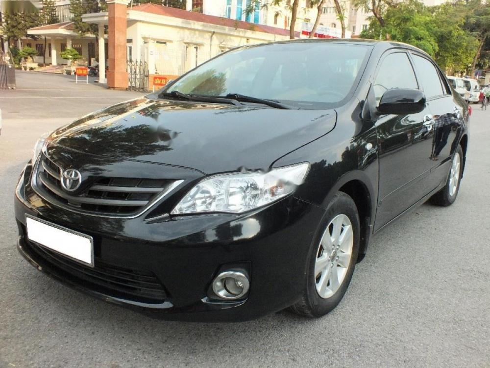 Toyota Corolla XLI 1.6 2011 - Cần bán lại xe Toyota Corolla XLI 1.6 năm 2011, màu đen, nhập khẩu chính chủ, 550tr