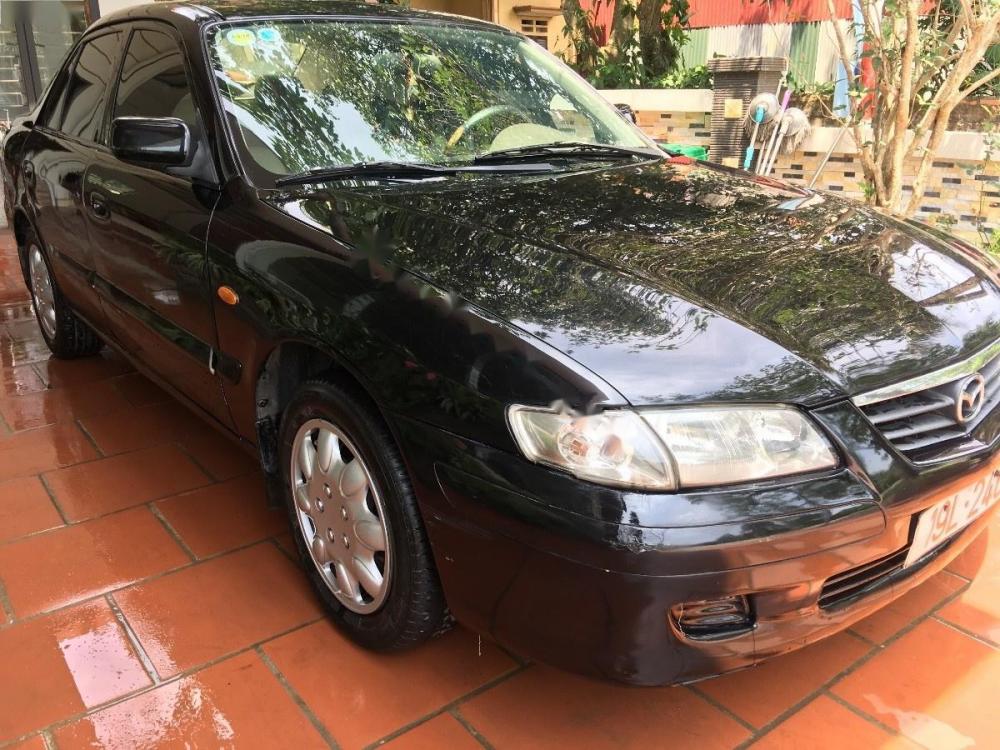 Mazda 626 2.0 MT 2000 - Bán xe Mazda 626 2.0 MT sản xuất 2000, màu đen, giá 142tr