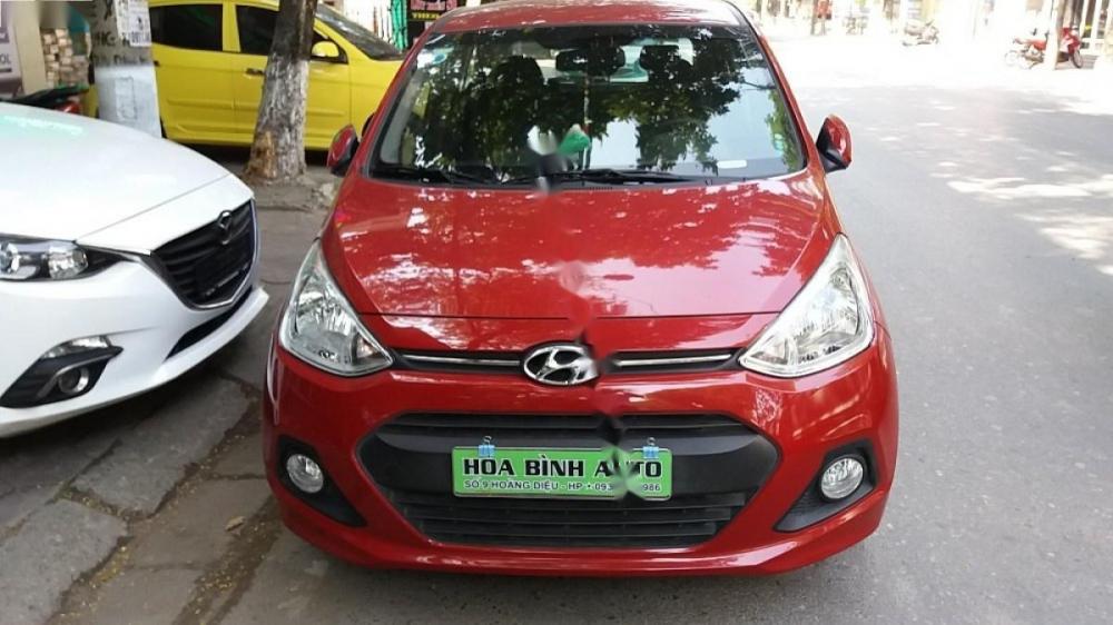 Hyundai Grand i10  1.0 AT 2015 - Chính chủ bán Hyundai Grand i10 1.0 AT đời 2015, màu đỏ, nhập khẩu