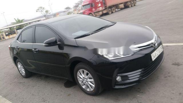 Toyota Corolla altis 2018 - Bán xe Toyota Corolla altis năm 2018, màu đen chính chủ, giá 730tr