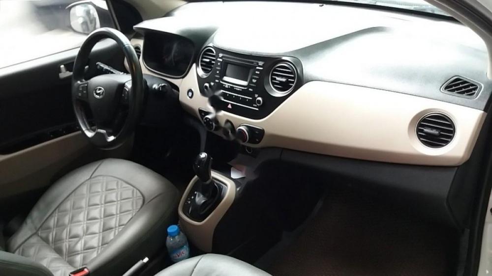 Hyundai Grand i10 1.0 AT 2016 - Chính chủ bán Hyundai Grand i10 1.0 AT 2016, màu trắng, nhập khẩu