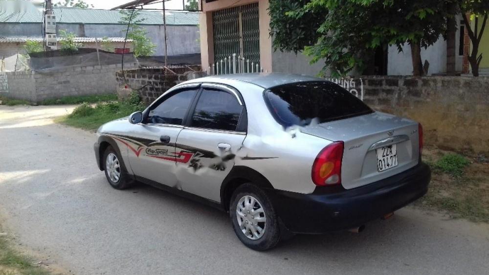 Daewoo Lanos SX 2003 - Bán xe Daewoo Lanos SX đời 2003, màu bạc