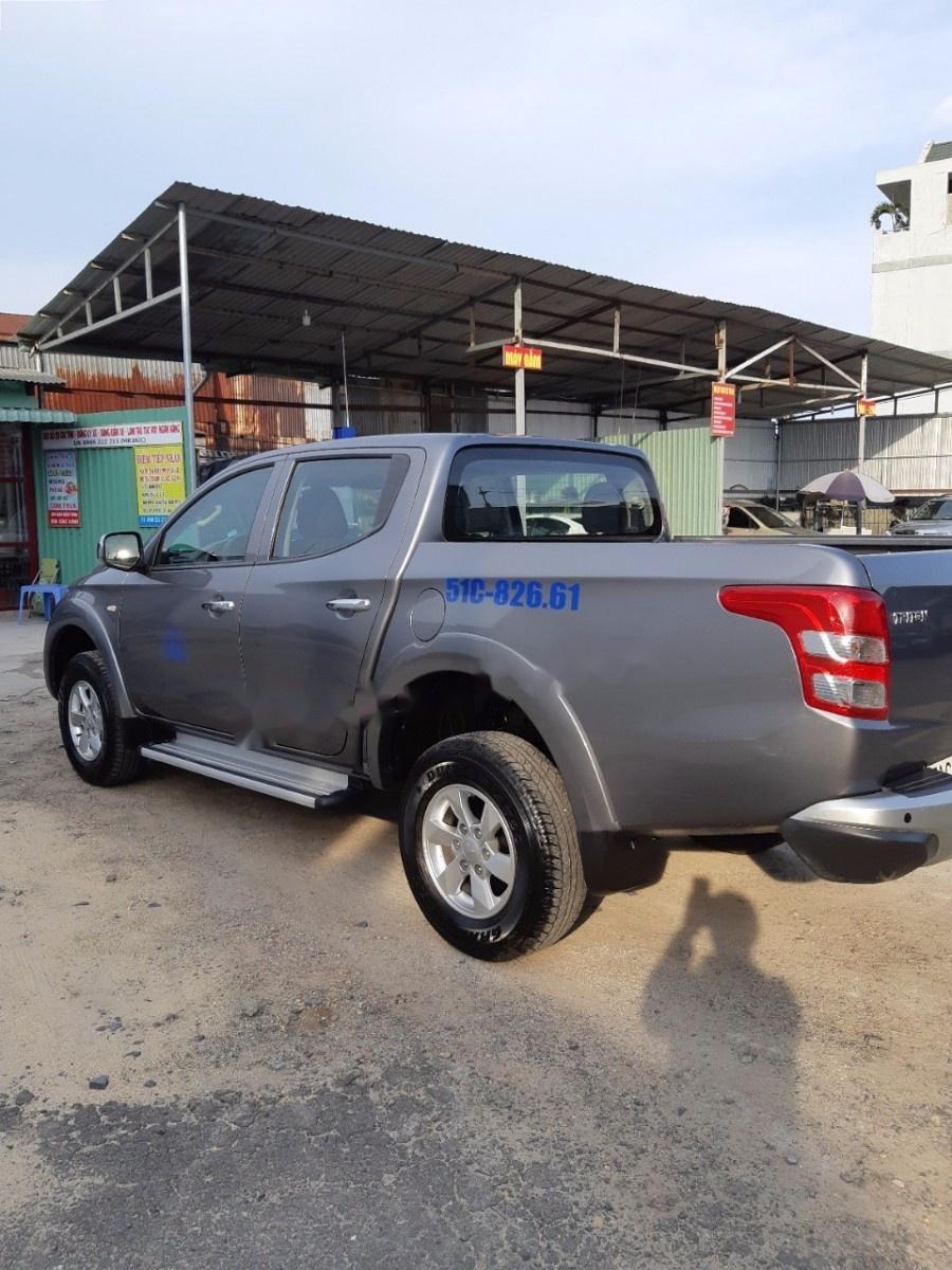 Mitsubishi Triton 4x2 MT 2016 - Bán Mitsubishi Triton 2.5MT sản xuất 2016, màu xám, xe nhập