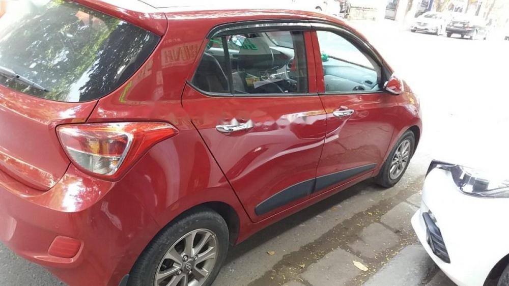 Hyundai Grand i10  1.0 AT 2015 - Chính chủ bán Hyundai Grand i10 1.0 AT đời 2015, màu đỏ, nhập khẩu