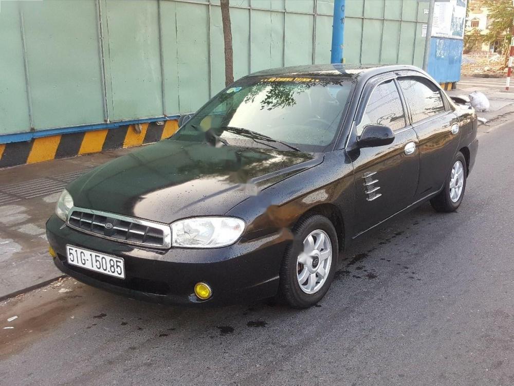 Kia Spectra 1.6MT 2004 - Bán Kia Spectra 1.6MT sản xuất năm 2004, màu đen  