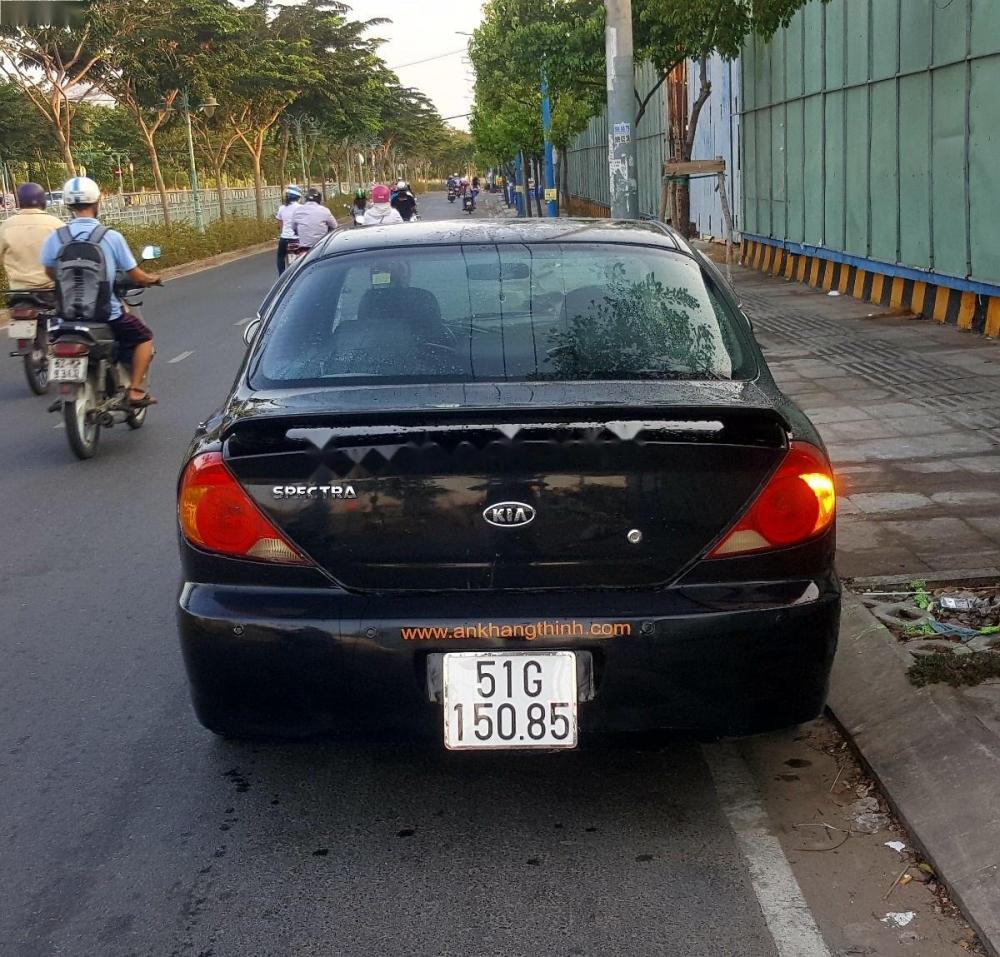 Kia Spectra 1.6MT 2004 - Bán Kia Spectra 1.6MT sản xuất năm 2004, màu đen  