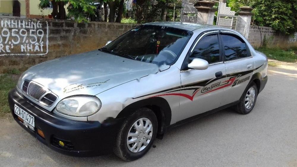 Daewoo Lanos SX 2003 - Bán xe Daewoo Lanos SX đời 2003, màu bạc