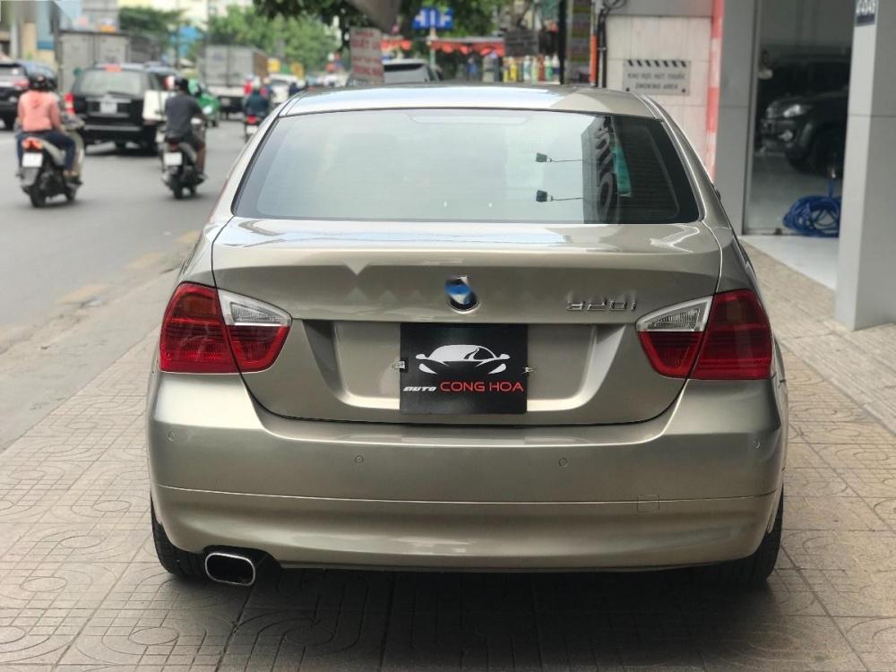 BMW 3 Series 320i 2007 - Bán xe BMW 3 Series 320i năm 2007, màu vàng, xe nhập