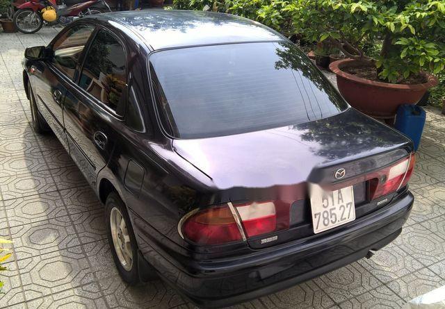 Mazda 323 1999 - Cần bán gấp Mazda 323 đời 1999, màu đen, giá tốt