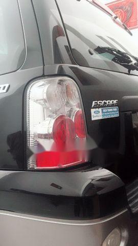 Ford Escape 2.3L 2007 - Cần bán Ford Escape 2.3L năm 2007, màu đen xe gia đình, giá 310tr