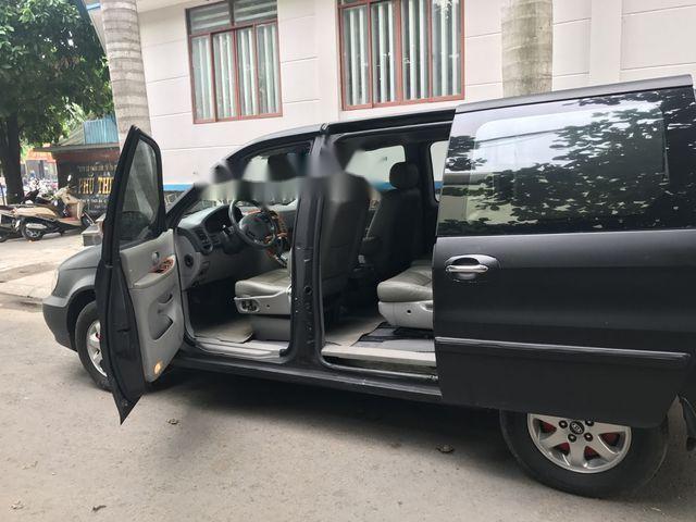 Kia Carnival 2009 - Bán xe Kia Carnival đời 2009, màu đen chính chủ, giá tốt